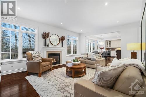 142 Chenoa Way, Nepean, ON - Indoor Photo Showing Living Room With Fireplace