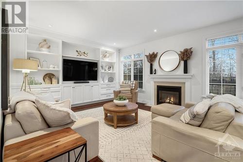 142 Chenoa Way, Nepean, ON - Indoor Photo Showing Living Room With Fireplace