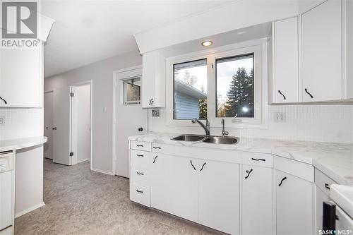 1989 New Market Drive, Tisdale, SK - Indoor Photo Showing Kitchen With Double Sink