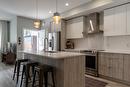 4-2973 Conlin Court, Kelowna, BC  - Indoor Photo Showing Kitchen With Stainless Steel Kitchen With Upgraded Kitchen 