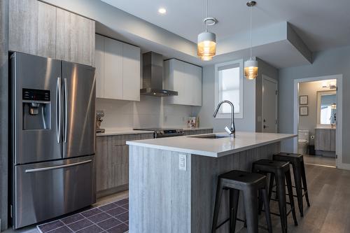 4-2973 Conlin Court, Kelowna, BC - Indoor Photo Showing Kitchen With Stainless Steel Kitchen With Upgraded Kitchen