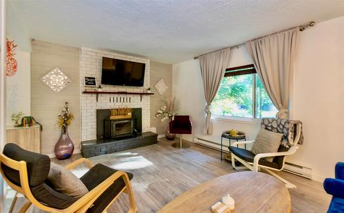 4179 Ashe Crescent, Scotch Creek, BC - Indoor Photo Showing Living Room With Fireplace