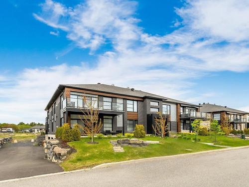 Exterior entrance - 7-303 Rue De L'Aigle, Carignan, QC - Outdoor With Facade