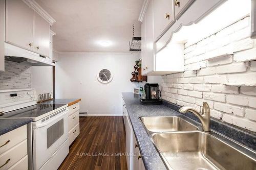 64-700 Harmony Rd N, Oshawa, ON - Indoor Photo Showing Kitchen With Double Sink