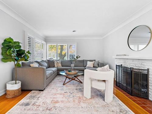 14 Cherrywood Ave, Grimsby, ON - Indoor Photo Showing Living Room With Fireplace