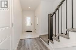 Entrance foyer featuring light hardwood / wood-style floors - 