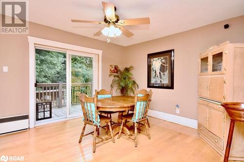 Dining space with light hardwood / wood-style floors and ceiling fan - 264 Salem Road, Barrie, ON 