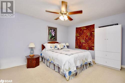 Bedroom featuring ceiling fan and carpet - 264 Salem Road, Barrie, ON 