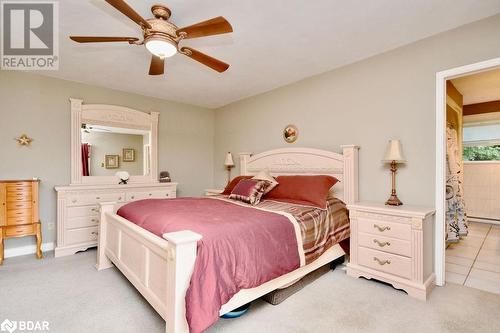 Bedroom featuring light colored carpet and ceiling fan - 264 Salem Road, Barrie, ON 