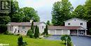 View of front facade with a front lawn and a garage - 264 Salem Road, Barrie, ON 