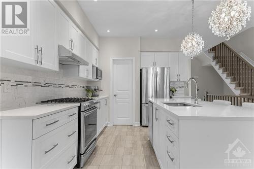 4921 Abbott Street E, Ottawa, ON - Indoor Photo Showing Kitchen With Double Sink With Upgraded Kitchen