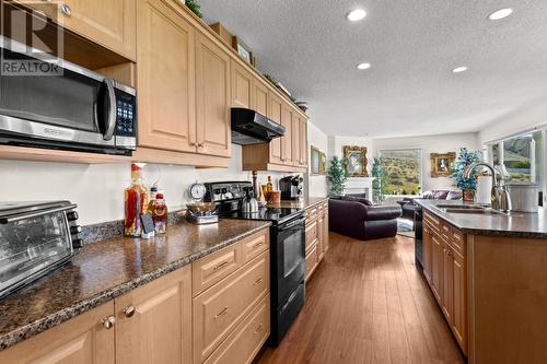 1270 Vista Heights Drive, Ashcroft, BC - Indoor Photo Showing Kitchen With Fireplace With Double Sink