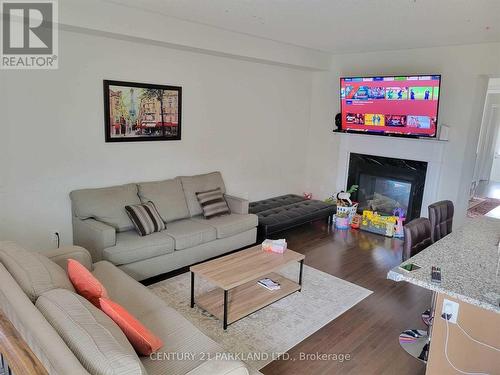 90 Tundra Road, Caledon, ON - Indoor Photo Showing Living Room With Fireplace