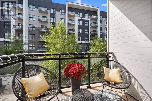 226 - 128 Grovewood Common, Oakville, ON - Outdoor With Balcony With Exterior