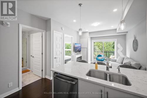 226 - 128 Grovewood Common, Oakville, ON - Indoor Photo Showing Kitchen With Double Sink