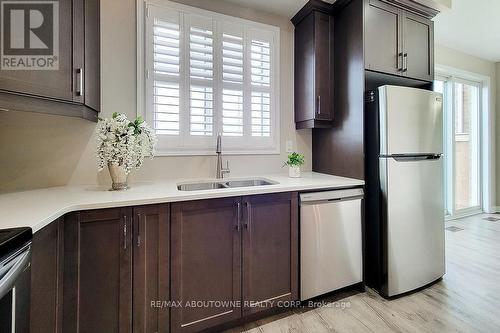 895 Ash Gate, Milton, ON - Indoor Photo Showing Kitchen With Double Sink