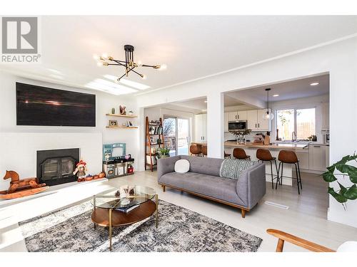 1544 94 Avenue, Dawson Creek, BC - Indoor Photo Showing Living Room With Fireplace