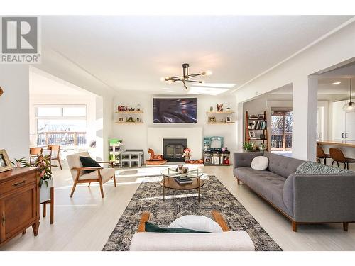 1544 94 Avenue, Dawson Creek, BC - Indoor Photo Showing Living Room With Fireplace