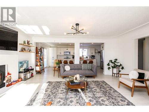 1544 94 Avenue, Dawson Creek, BC - Indoor Photo Showing Living Room With Fireplace