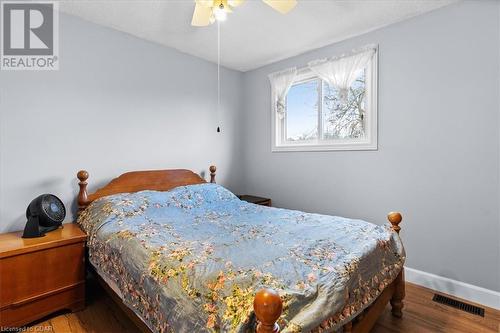 Bedroom featuring wood-type flooring and ceiling fan - 253 Auden Road, Guelph, ON - Indoor Photo Showing Bedroom