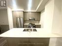 Th 332 - 100 Honeycrisp Crescent, Vaughan, ON  - Indoor Photo Showing Kitchen With Double Sink With Upgraded Kitchen 