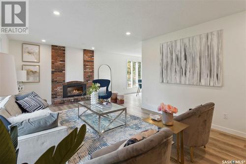 70 Duncan Crescent, Saskatoon, SK - Indoor Photo Showing Living Room With Fireplace