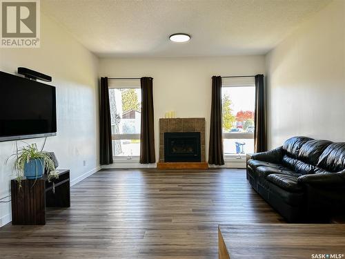 58 Dunfield Crescent, Meadow Lake, SK - Indoor Photo Showing Living Room With Fireplace