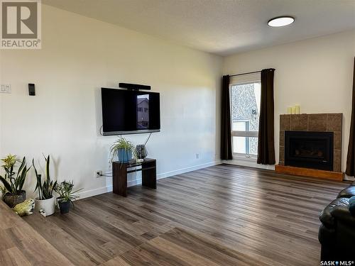 58 Dunfield Crescent, Meadow Lake, SK - Indoor Photo Showing Living Room With Fireplace