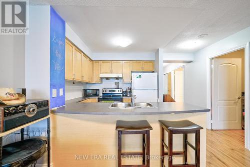 3105 - 60 Brian Harrison Way, Toronto, ON - Indoor Photo Showing Kitchen With Double Sink