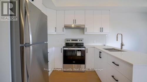 70 Chamberlain Avenue, Toronto, ON - Indoor Photo Showing Kitchen With Double Sink