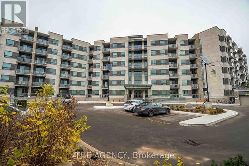 411 - 383 Main Street E, Milton, ON - Outdoor With Balcony With Facade