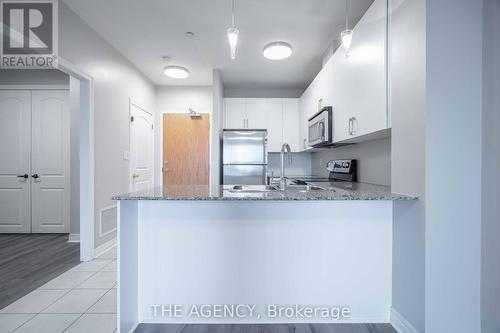 411 - 383 Main Street E, Milton, ON - Indoor Photo Showing Kitchen