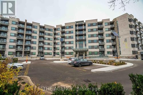 411 - 383 Main Street E, Milton, ON - Outdoor With Balcony With Facade