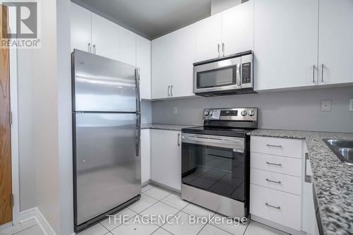 411 - 383 Main Street E, Milton, ON - Indoor Photo Showing Kitchen With Stainless Steel Kitchen