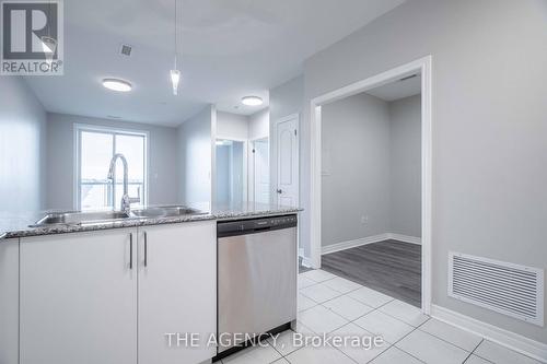 411 - 383 Main Street E, Milton, ON - Indoor Photo Showing Kitchen With Double Sink