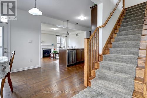 404 Clarkson Gate, Milton, ON - Indoor Photo Showing Other Room With Fireplace