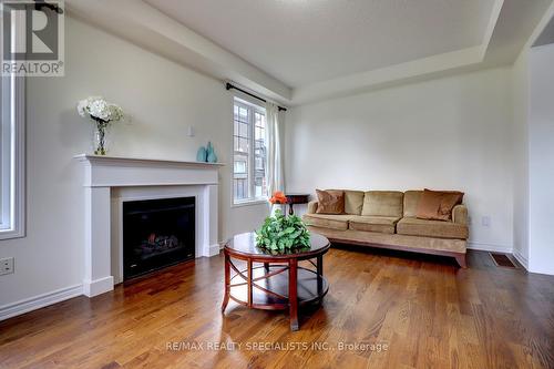 404 Clarkson Gate, Milton, ON - Indoor Photo Showing Living Room With Fireplace