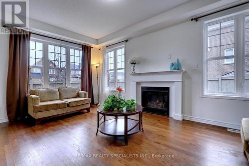 404 Clarkson Gate, Milton, ON - Indoor Photo Showing Living Room With Fireplace