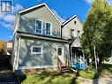 View of front facade with a porch - 21 Minto Avenue, Hamilton, ON 