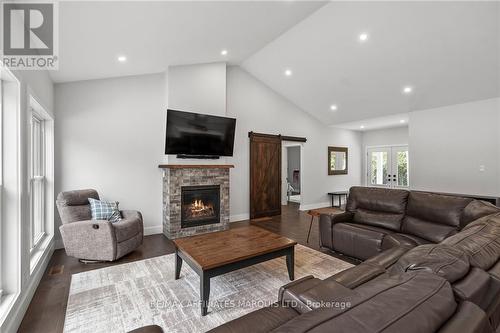 3399 Lakeshore Road, North Glengarry, ON - Indoor Photo Showing Living Room With Fireplace