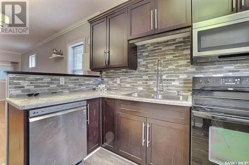 1437 Wascana Street, Regina, SK - Indoor Photo Showing Kitchen With Double Sink