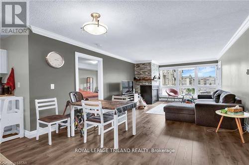 312 - 5 Jacksway Crescent, London, ON - Indoor Photo Showing Living Room With Fireplace