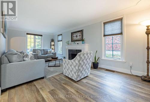 357 Sunset Drive, Central Elgin, ON - Indoor Photo Showing Living Room With Fireplace