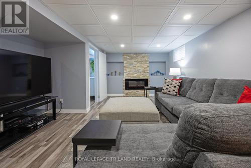 357 Sunset Drive, Central Elgin, ON - Indoor Photo Showing Living Room With Fireplace