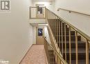 Staircase featuring tile patterned flooring - 107 Bond Street Unit# 201, Orillia, ON  - Indoor Photo Showing Other Room 