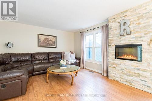 173 Toronto Street, Barrie, ON - Indoor Photo Showing Living Room With Fireplace