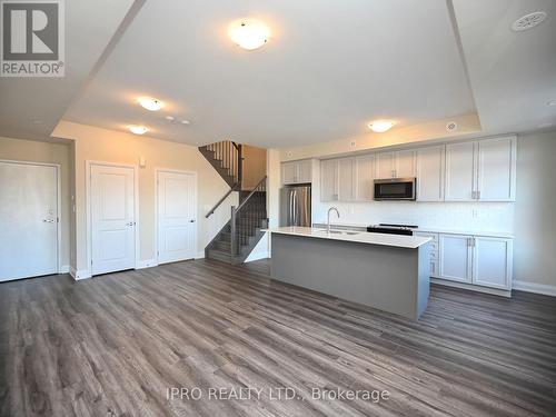 121 - 1573 Rose Way, Milton, ON - Indoor Photo Showing Kitchen