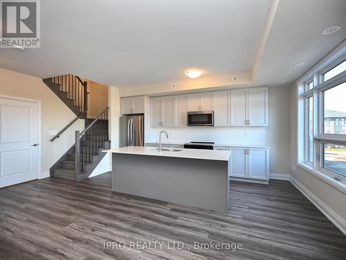 121 - 1573 Rose Way, Milton, ON - Indoor Photo Showing Kitchen