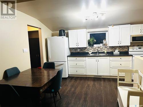 169 Darlington Street E, Yorkton, SK - Indoor Photo Showing Kitchen With Double Sink