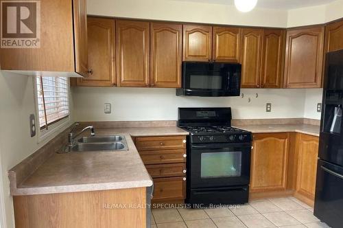 265 - 2534 Carberry Way, Oakville, ON - Indoor Photo Showing Kitchen With Double Sink